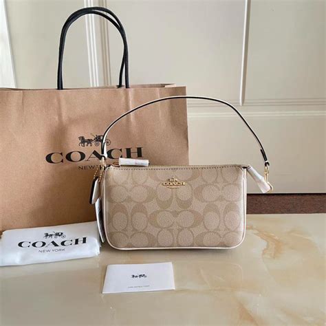 coach purses official website